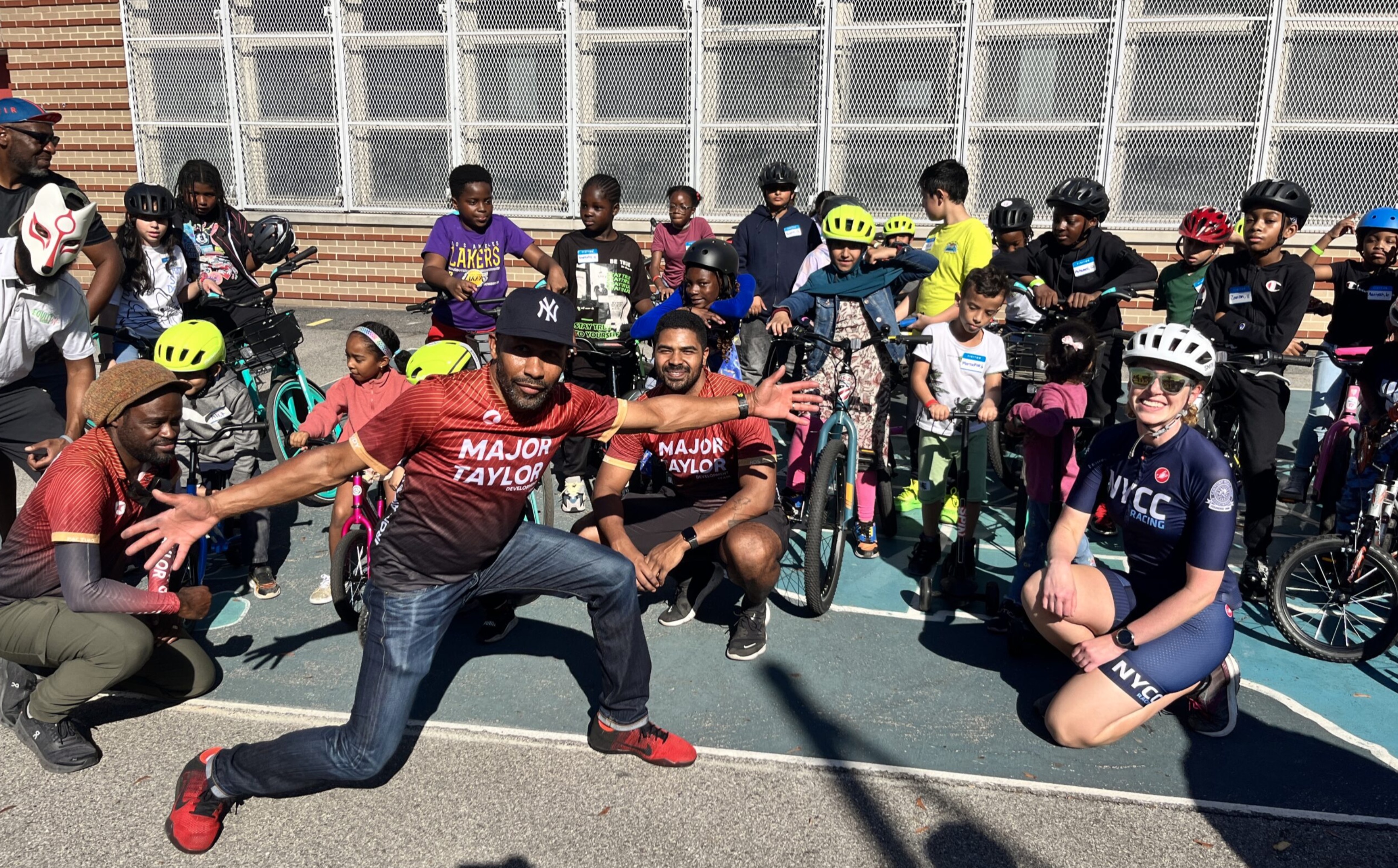 Children and instructors participating in a community cycling program