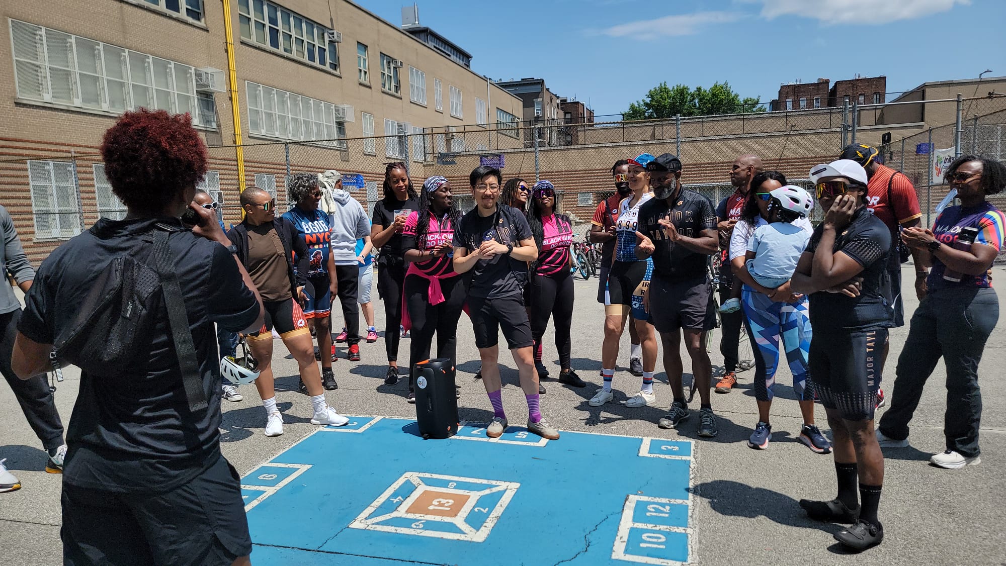 Diverse group of adults gathered in a community space