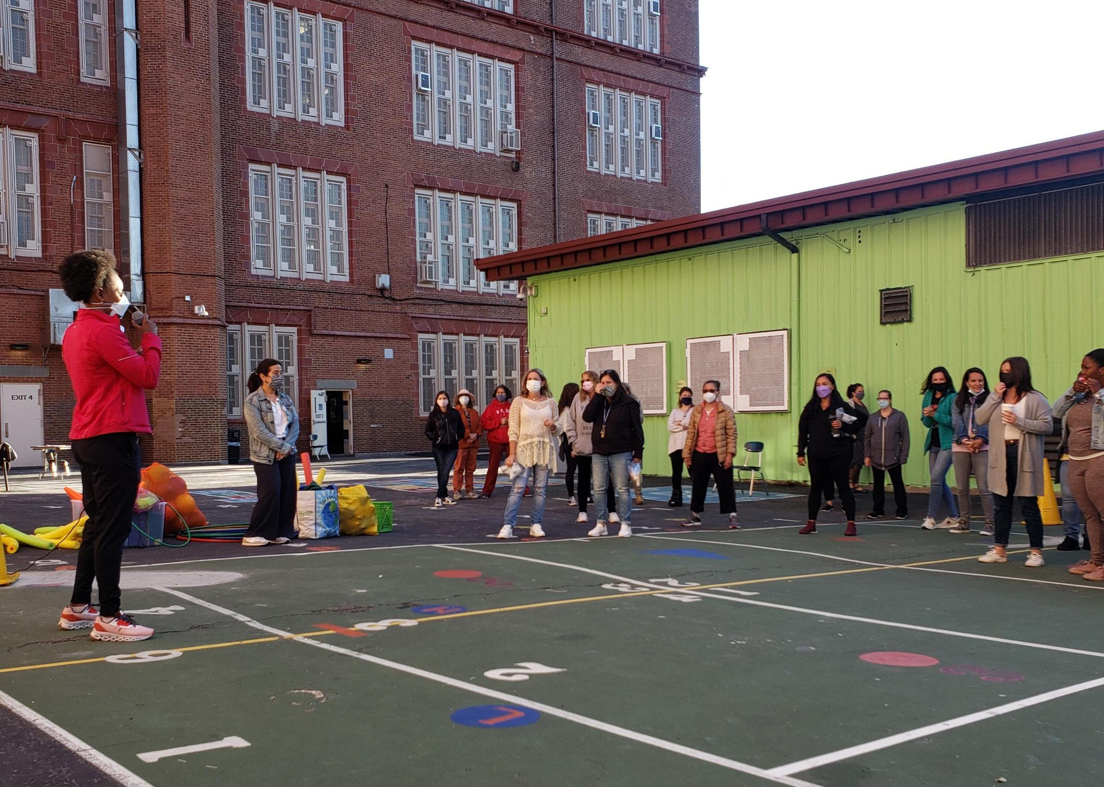 Teachers and staff at PS 32 school playground