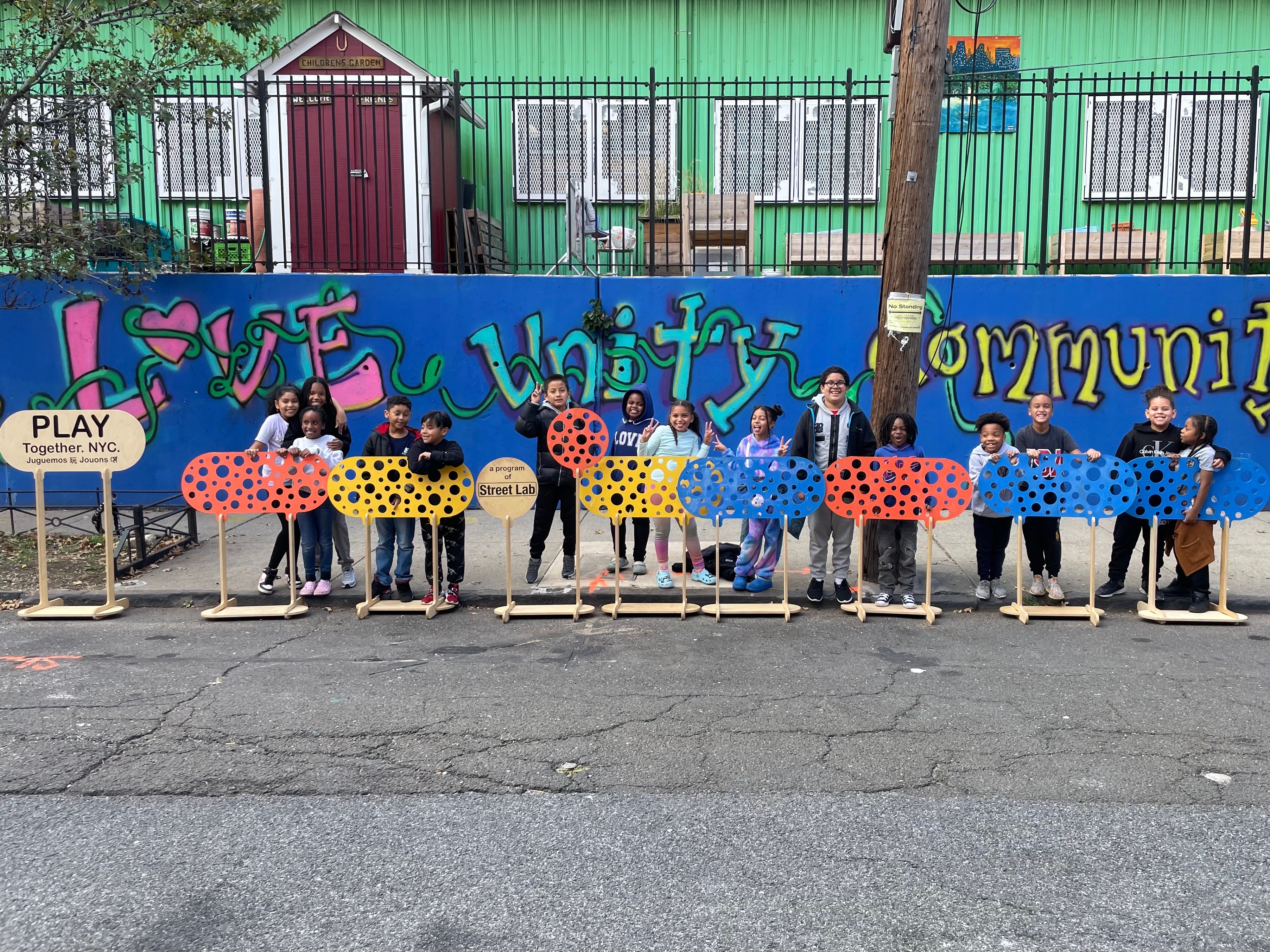 Children with colorful play dividers from Street Lab's Play Together NYC program
